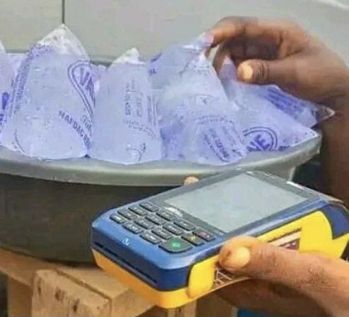 Naira Scarcity: ‘Pure Water’ Seller Goes Cashless, Sells With PoS