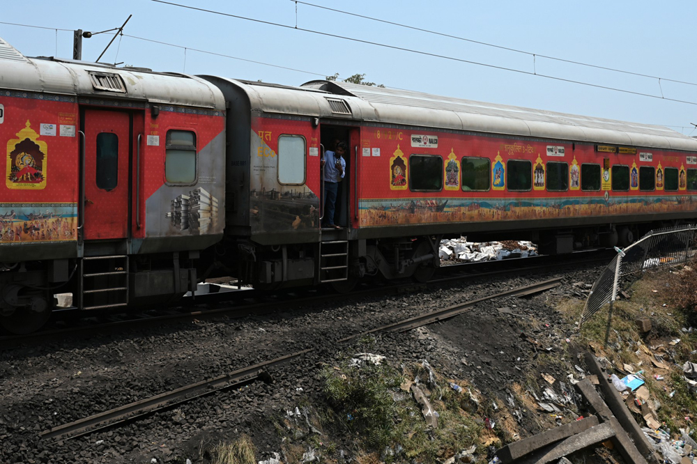 Train crushes 11 passengers to death who jumped out over fire rumours