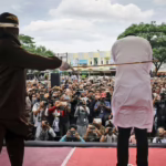 aptopix-indonesia-gay-couple-caned
